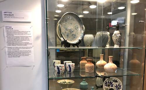 ceramics artwork in display cabinet