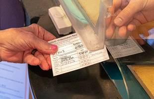 employee submitting vaccination proof